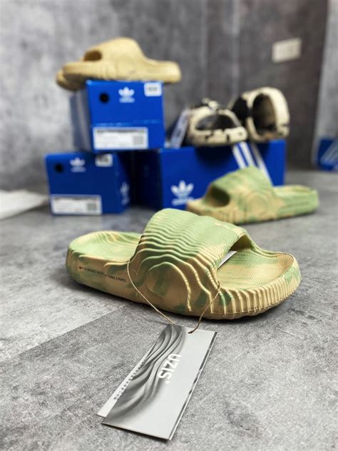 Say Goodbye to Boring Slides: Adidas adilette 22 in Magic Lime and Desert Sand